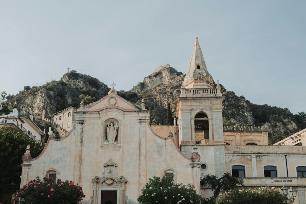 an old church with a steeple on top of it